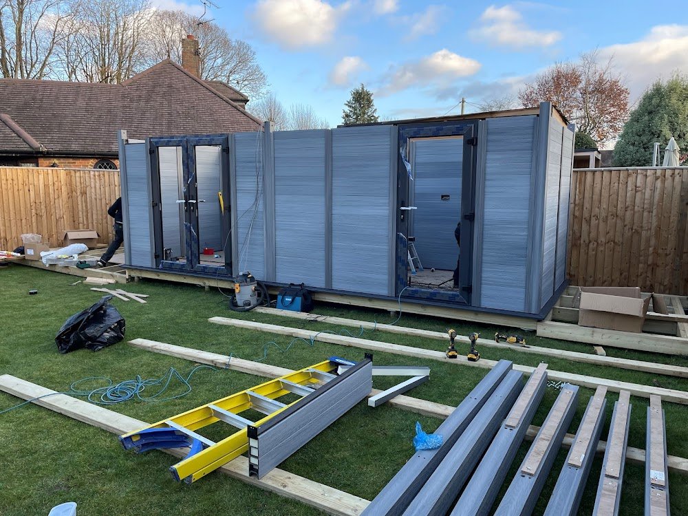 Putting in the windows and doors to the garden room